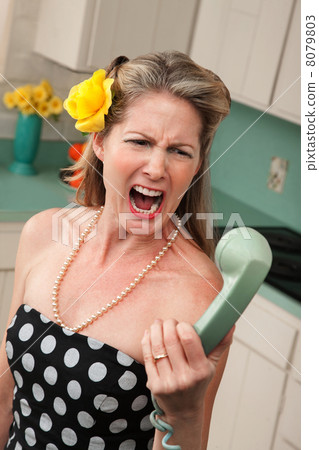 Woman Yells at a Phone 8079803