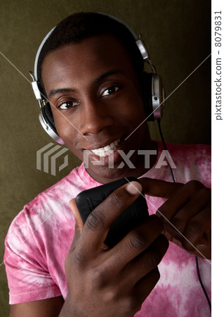 Man Selects Music on His MP3 player Man Selects Music on His MP3 player 8079831