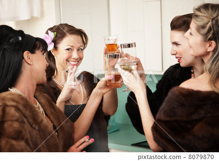 Happy Housewives Drink in the Kitchen 8079870