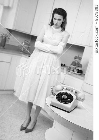 Woman Waiting By Telephone Woman Waiting By Telephone 8079883