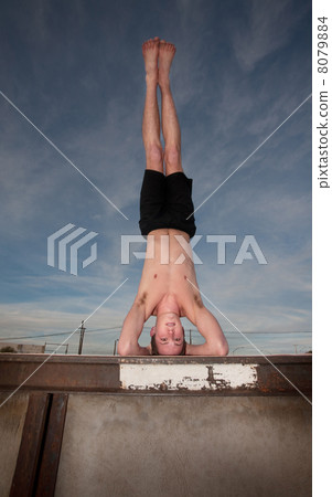 Young Man in Yoga Position Young Man in Yoga Position 8079884