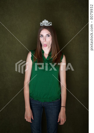 Woman With Tiara Sticks Out Her Tongue Woman With Tiara Sticks Out Her Tongue 8079932