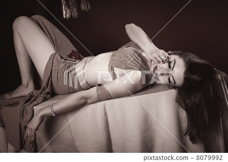 Beautiful Belly Dancer Lying Down Beautiful Belly Dancer Lying Down 8079992