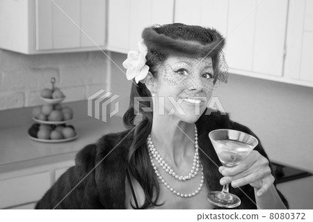 Woman Enjoying Martini 8080372
