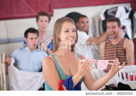 Woman with Thong in Laundromat Woman with Thong in Laundromat 8080565