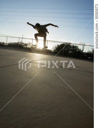 Teenage Skateboarder Airborne 8080873