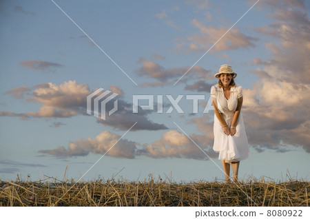 Woman Against a Cloudy Sky Woman Against a Cloudy Sky 8080922
