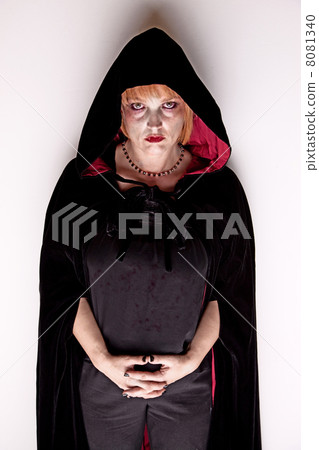 Female Vampire in a Dark Hood 8081340