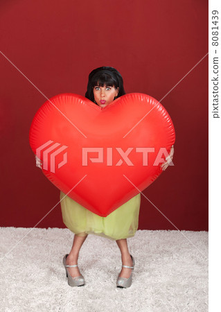 Woman With Giant Heart Woman With Giant Heart 8081439