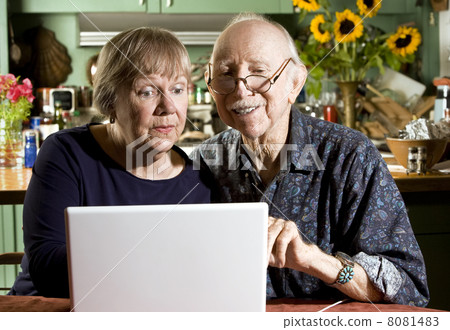 Senior Couple with a Laptop Computer Senior Couple with a Laptop Computer 8081483