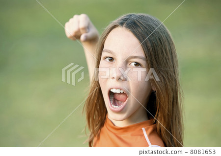 Boy with Long Hair Throws a Punch Boy with Long Hair Throws a Punch 8081653