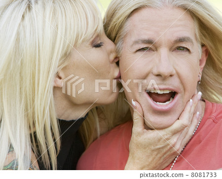 Woman kissing a man 8081733