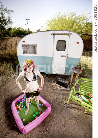 Woman outside a trailer Woman outside a trailer 8081820