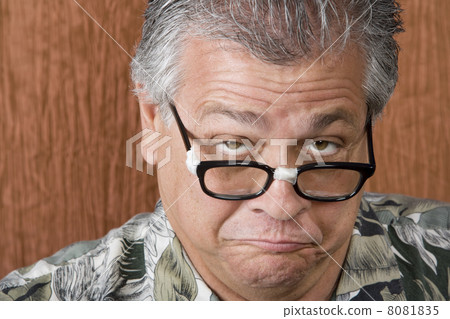 Silly Man with Taped Glasses 8081835