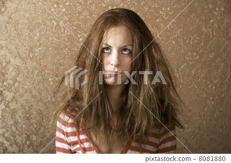 Young Woman with Messy Hair 8081880