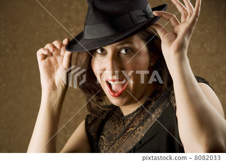 Hispanic Woman Tipping Her Hat 8082033