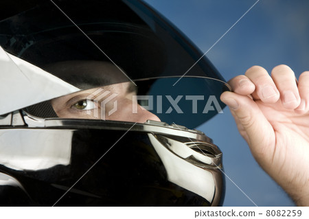 Man in a motorcycle helmet 8082259