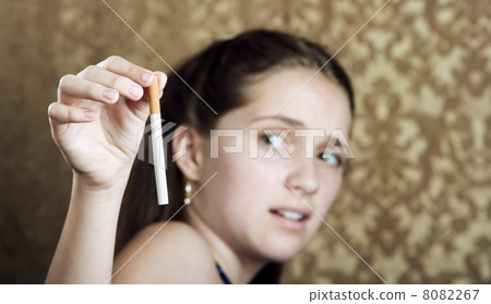 Young Girl Recoiling from a Cigarette Young Girl Recoiling from a Cigarette 8082267