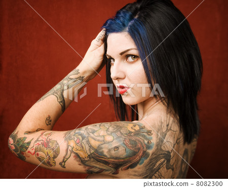 Woman with tattoos 8082300