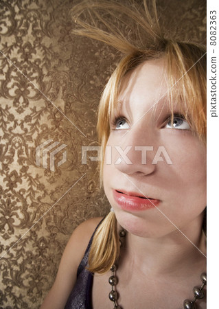 Young bored blonde girl 8082363