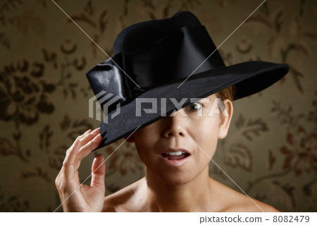 Ethnic woman in a black hat 8082479