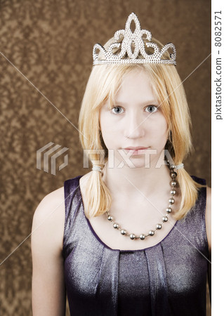 Pretty young girl with a tiara 8082571