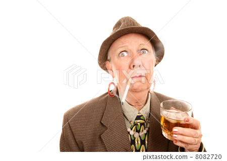 Senior Woman in Mans Clothing with Cigarette and Drink Senior Woman in Mans Clothing with Cigarette and Drink 8082720