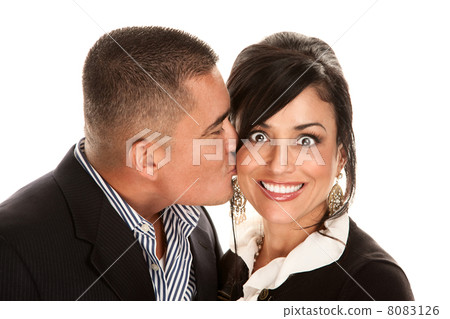Hispanic man kissing pretty woman Hispanic man kissing pretty woman 8083126