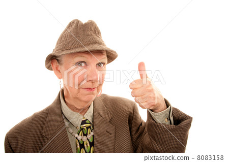 Senior woman in drag giving thumbs up gesture Senior woman in drag giving thumbs up gesture 8083158