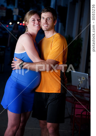 Pregnant woman with male partner Pregnant woman with male partner 8083236