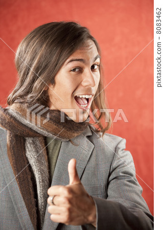 Handsome Young Man with Thumbs Up Gesture 8083462