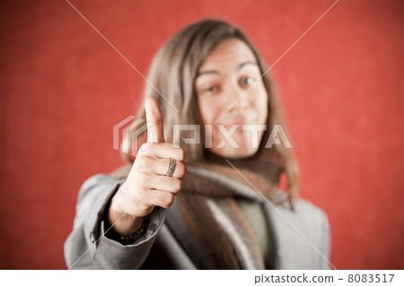 Handsome Young Man with Thumbs Up Gesture 8083517