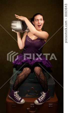 Pretty Girl in Purple on Green Background with Big Radio Pretty Girl in Purple on Green Background with Big Radio 8083643