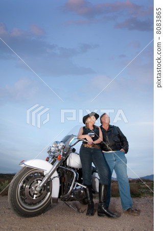Motorcycle couple 8083865