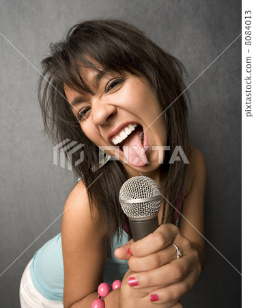 Beautiful Young Singer Sticking Out Her Tongue Beautiful Young Singer Sticking Out Her Tongue 8084013
