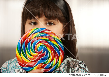 Cute young girl with lollipop Cute young girl with lollipop 8084067