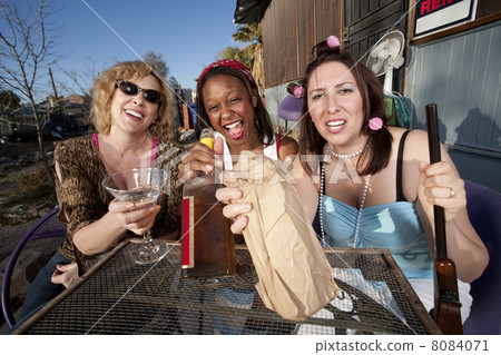 Three women drinking alcohol 8084071