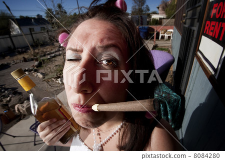Hispanic woman on back patio 8084280