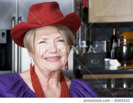Senior Woman Wearing Red Hat 8084281