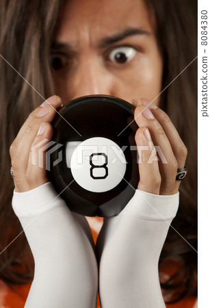 Man predicting the future with magic toy ball Man predicting the future with magic toy ball 8084380