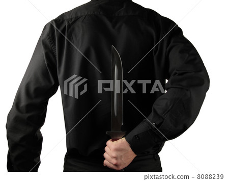 standing man in black with knife for backs standing man in black with knife for backs 8088239
