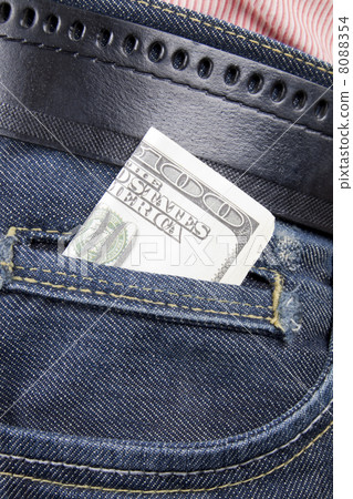 Stack of dollar bills in jeans pocket Stack of dollar bills in jeans pocket 8088354