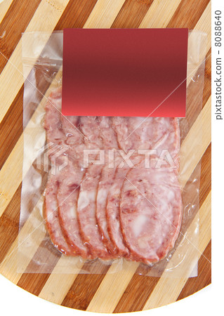 sliced meat packaged on plate 8088640