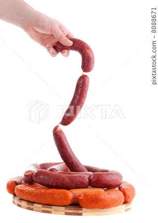 hand holding sausages hand holding sausages 8088671