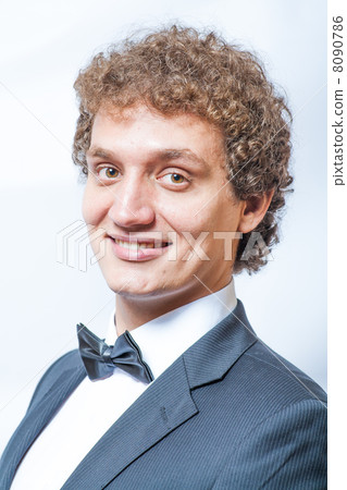 Closeup portrait of young business man in waistcoat Closeup portrait of young business man in waistcoat 8090786