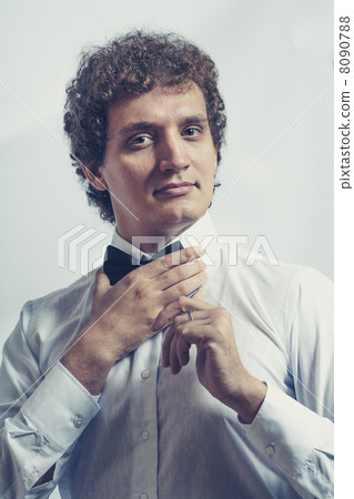 Funny businessman showing OK sign on gray studio shot Funny businessman showing OK sign on gray studio shot 8090788