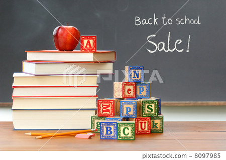 Pile of books with wooden blocks Pile of books with wooden blocks 8097985