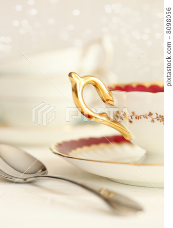 Closeup of a tea cup and spoon 8098056