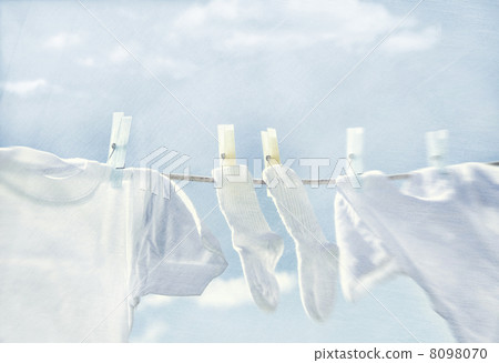 Clothes hanging on clothesline 8098070