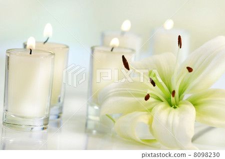 Lily flower with candle Lily flower with candle 8098230